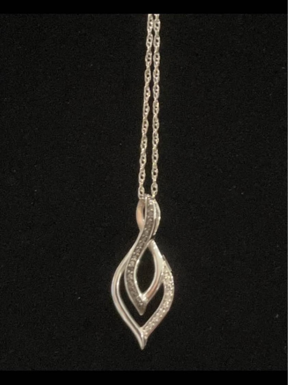 Sterling silver white and black stone infinity necklace